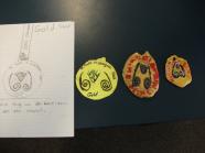 Modelling the medal designs.