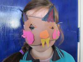A student wearing her cat mask