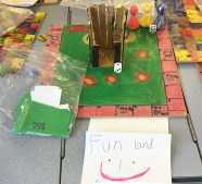 Game board with squares and structure in the middle