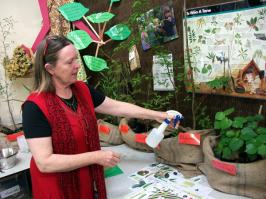 Heather tending plants.
