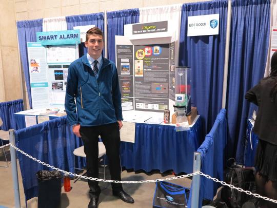 Student displaying his bulk bin dispenser
