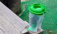 A technological system in a plastic container that has light and sound outputs when the bell is rung
