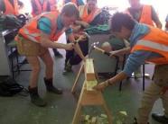 Students working with wood.