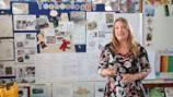 Teacher standing in front of a whiteboard